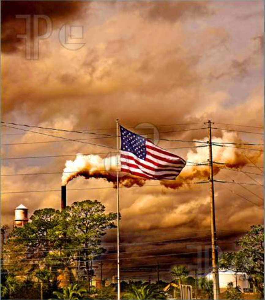 Smoke blowing from pipes into an orange sky