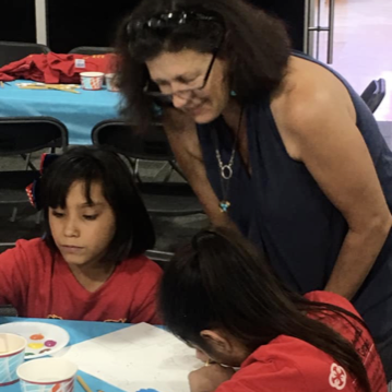 Diana Barnes with student artists, 2019
