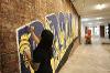 Lynne Yun painting ‘Broadway’ mural at 120 Broadway, Manhattan, NY