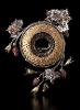 Lin Stanionis, 'Awakening' (brooch), 18K gold, sterling, garnets, enamel, snake skeleton