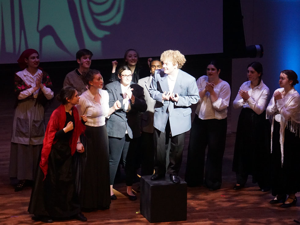 Students on stage performing Ragtime.