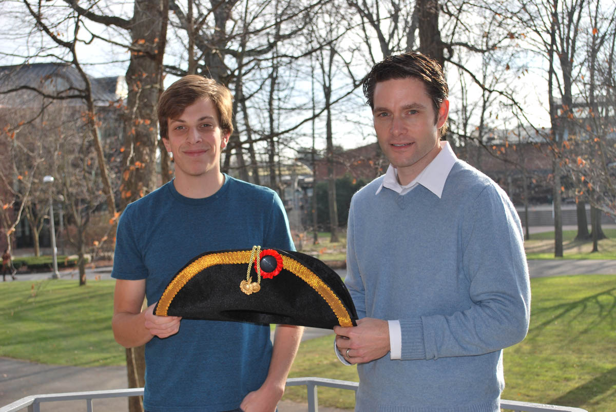 Holding+the+captain%27s+hat