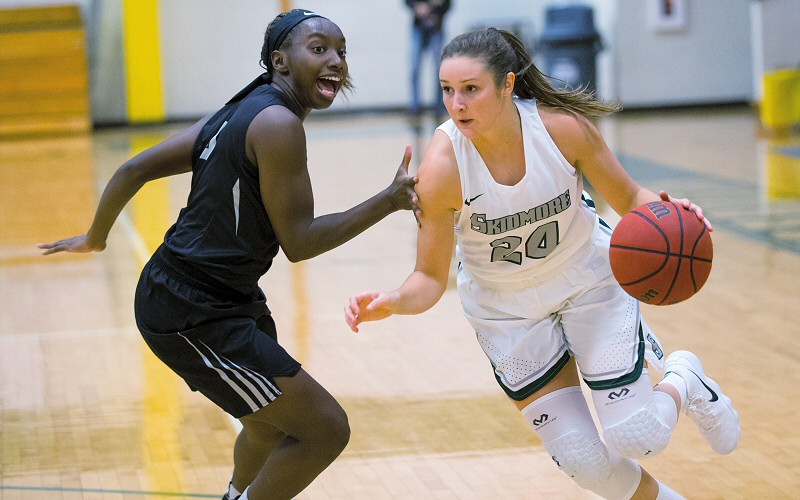 Hey, wait! Haley English '19 hustles right past a Bowdoin defender.