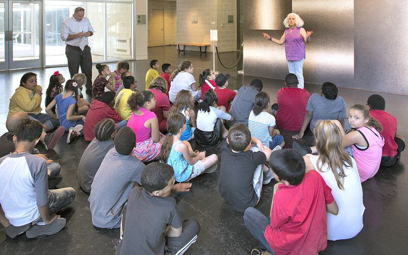Hamilton Elementary students discuss the Tang's Sol Lewitt pencil art with museum educator Ginger Ertz.