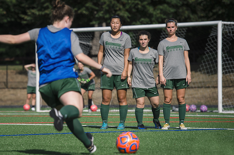 Brianna Cochran '18, Noa Mills '21, Jemima Cochrane '18 face Emily Mendes '19, soccer