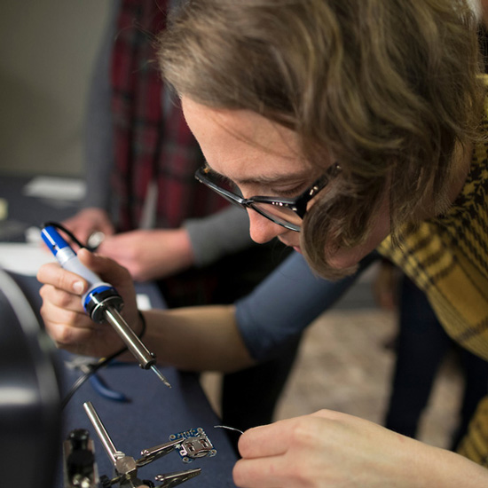 Sarah+Friedland%2C+Storytellers%27+Institute+Director+solders+during+an+open+house+at+The+Hub