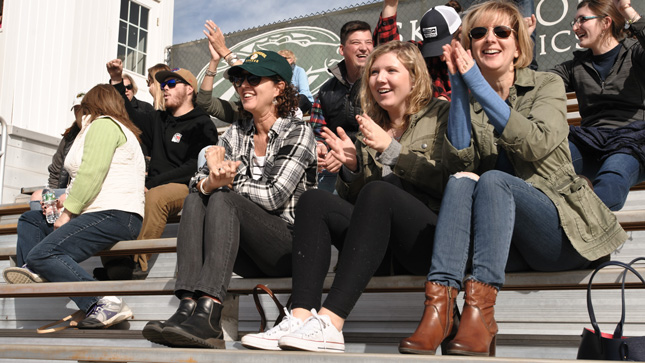 Skidmore families in the stands at a soccer game