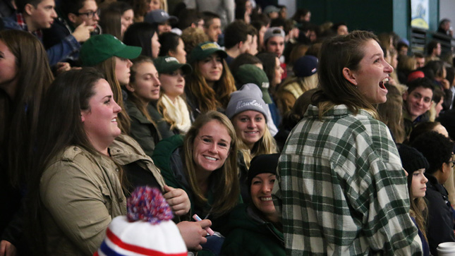 Skidmore student fans at a hockey game