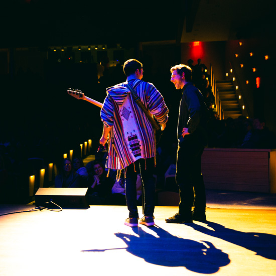 Two+male+students+perform+Beatles+music+on+stage
