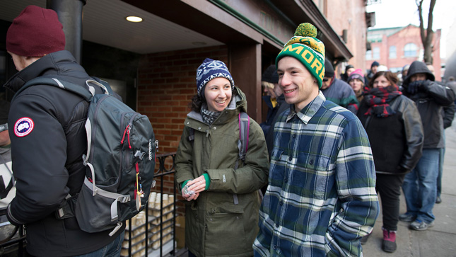 Skidmore student wait in line to get a food sample during Chowderfest