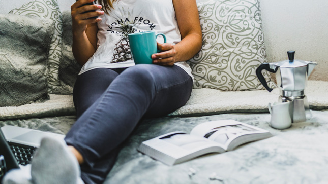 Female student studying in her dorm room