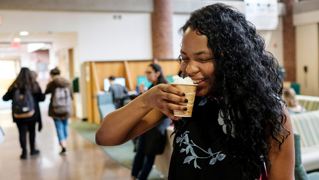 Female student drinking hot chocolate