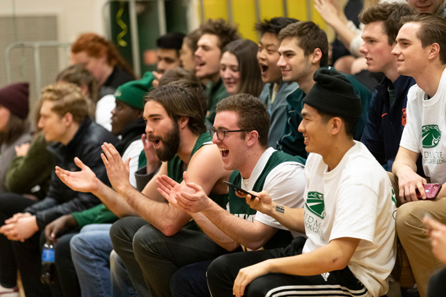 Skidmore students cheer on their friends during the Big Green Scream