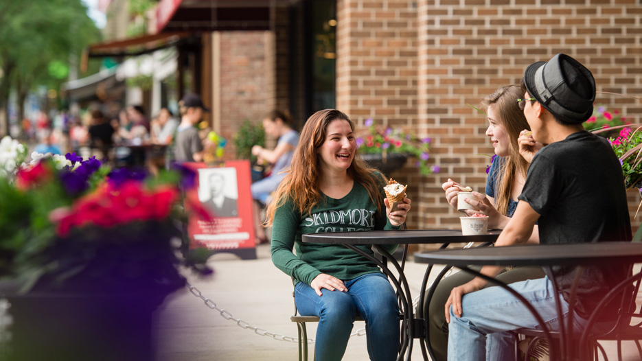 Three students have ice cream in downtown Saratoga Springs