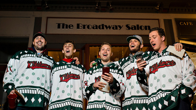 A group of men sing during a festival outside