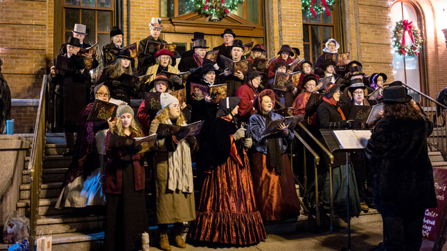 A choir of victorian-dressed people