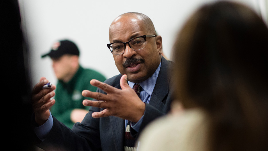 Associate Professor Tim Harper of Skidmore College teaches students in a classroom 