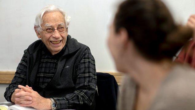 Lewis Taub sits in classroom