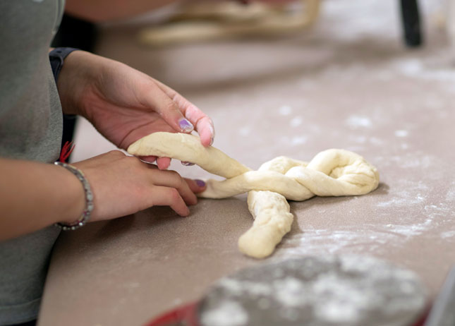 Students preparing challah