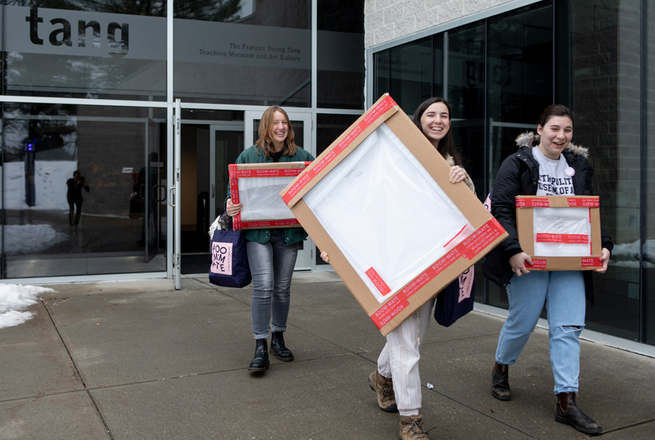 Students take artwork home from the Tang