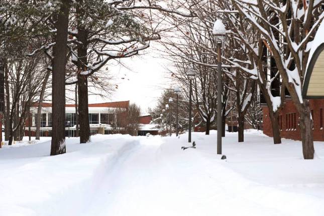 A path through a snow-covered campus