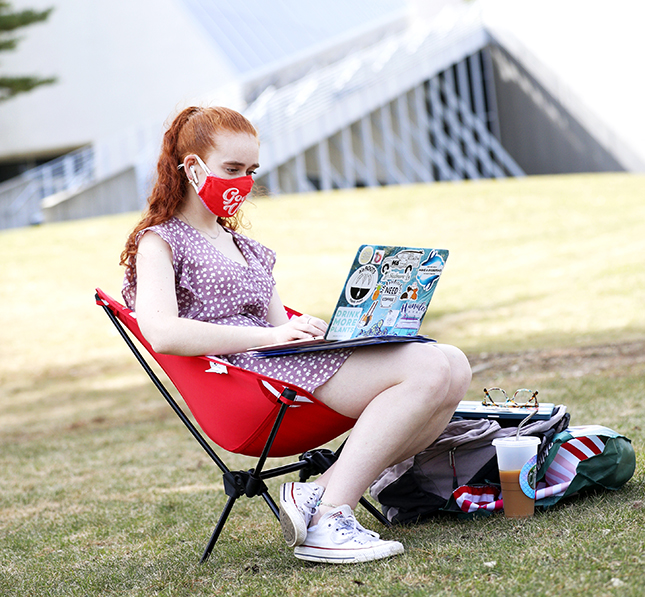 A student outside the Tang Teaching Museum