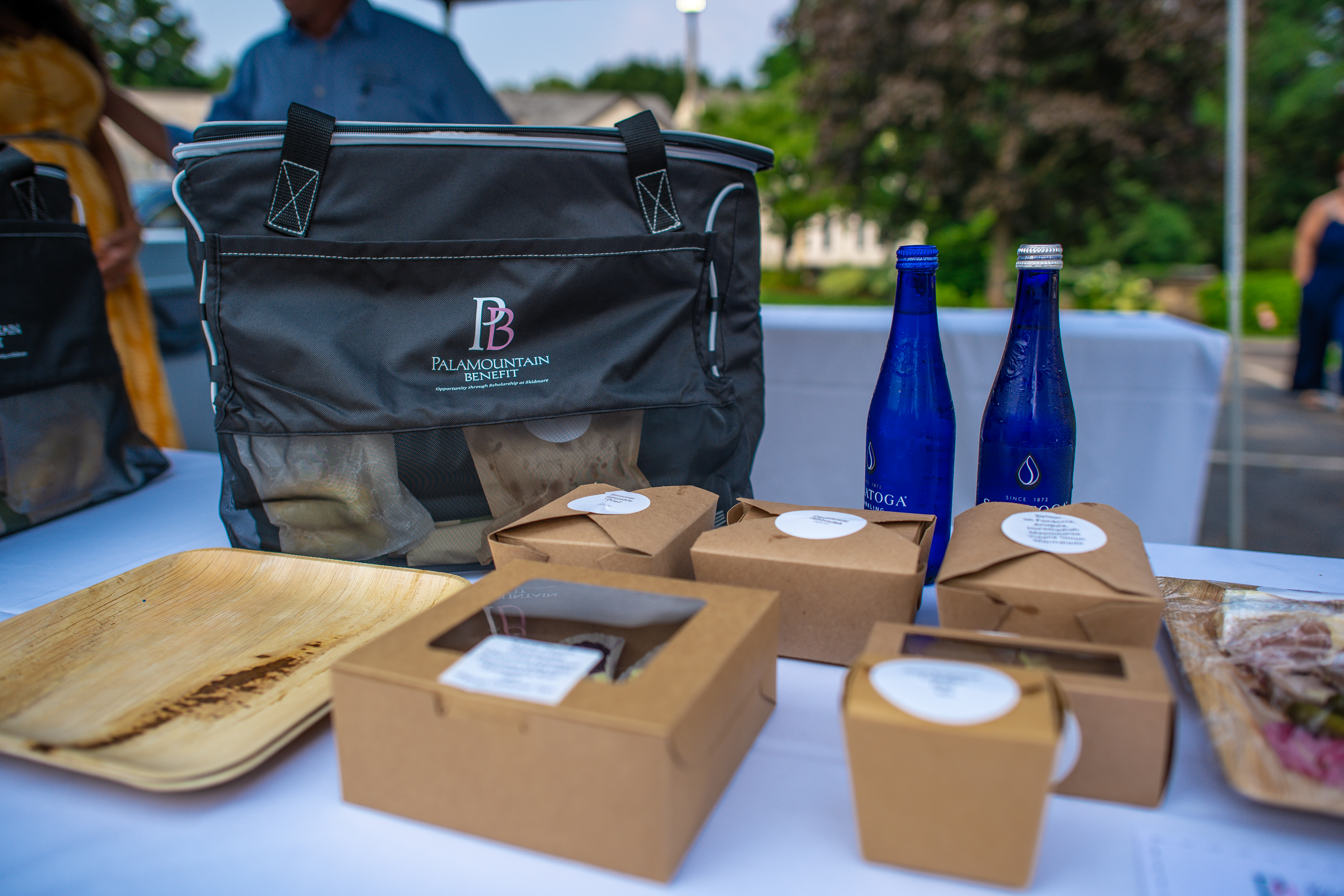 The baskets, created by Skidmore’s award-winning culinary team, featured delectable treats ranging from a charcuterie board featuring foie gras and duck Galantine to a saffron-aioli, New England lobster roll kit.
