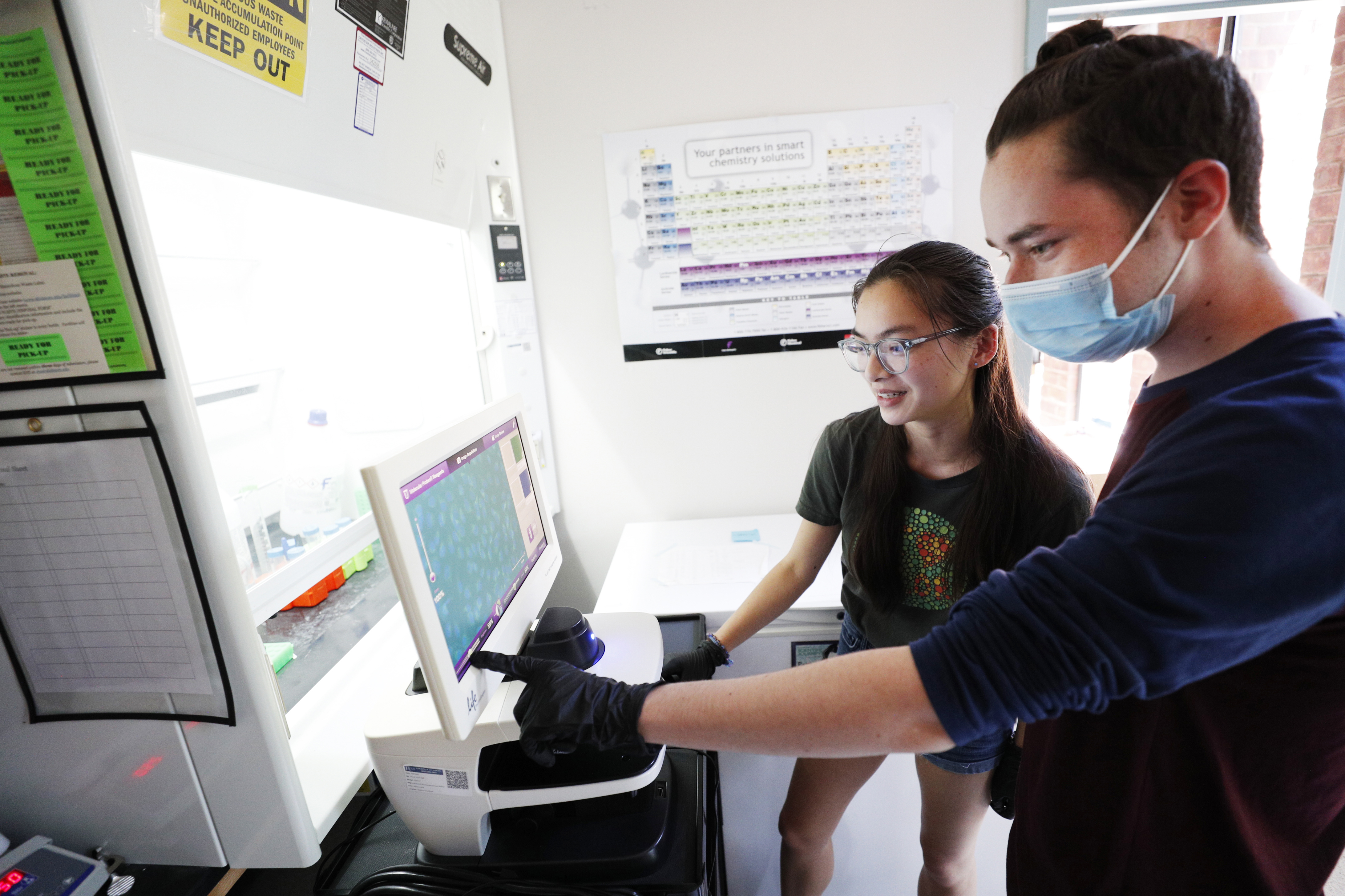 Emily Gilbert ’22, left, and Richard Glynn ’24 conduct research with Sarita Lagalwar, associate professor and director of the Neuroscience Program, as part of the Summer Faculty Student Research Program. 