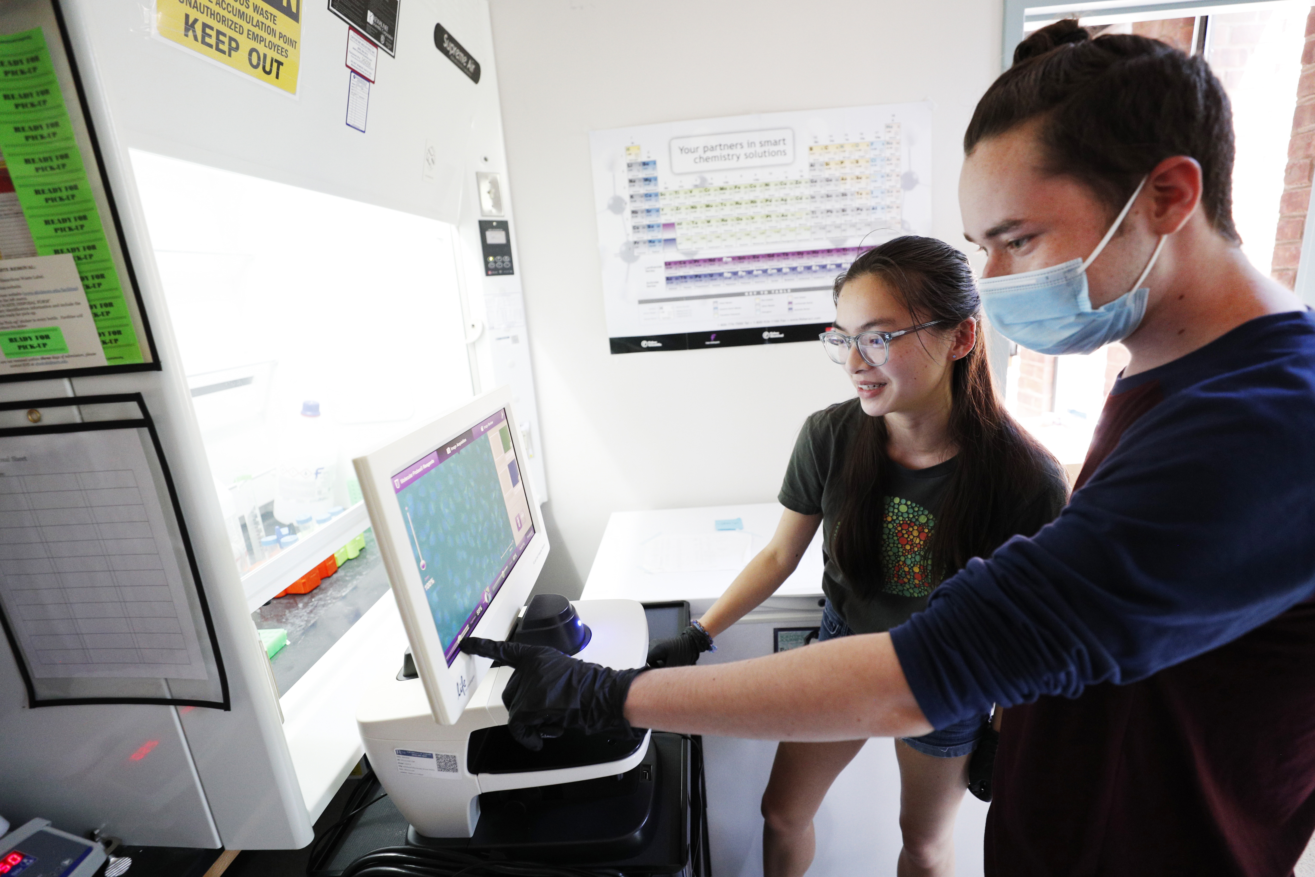 Emily Gilbert ’22, left, and Richard Glynn ’24 conduct research with Sarita Lagalwar, associate professor and director of the Neuroscience Program, as part of the Summer Faculty Student Research Program.