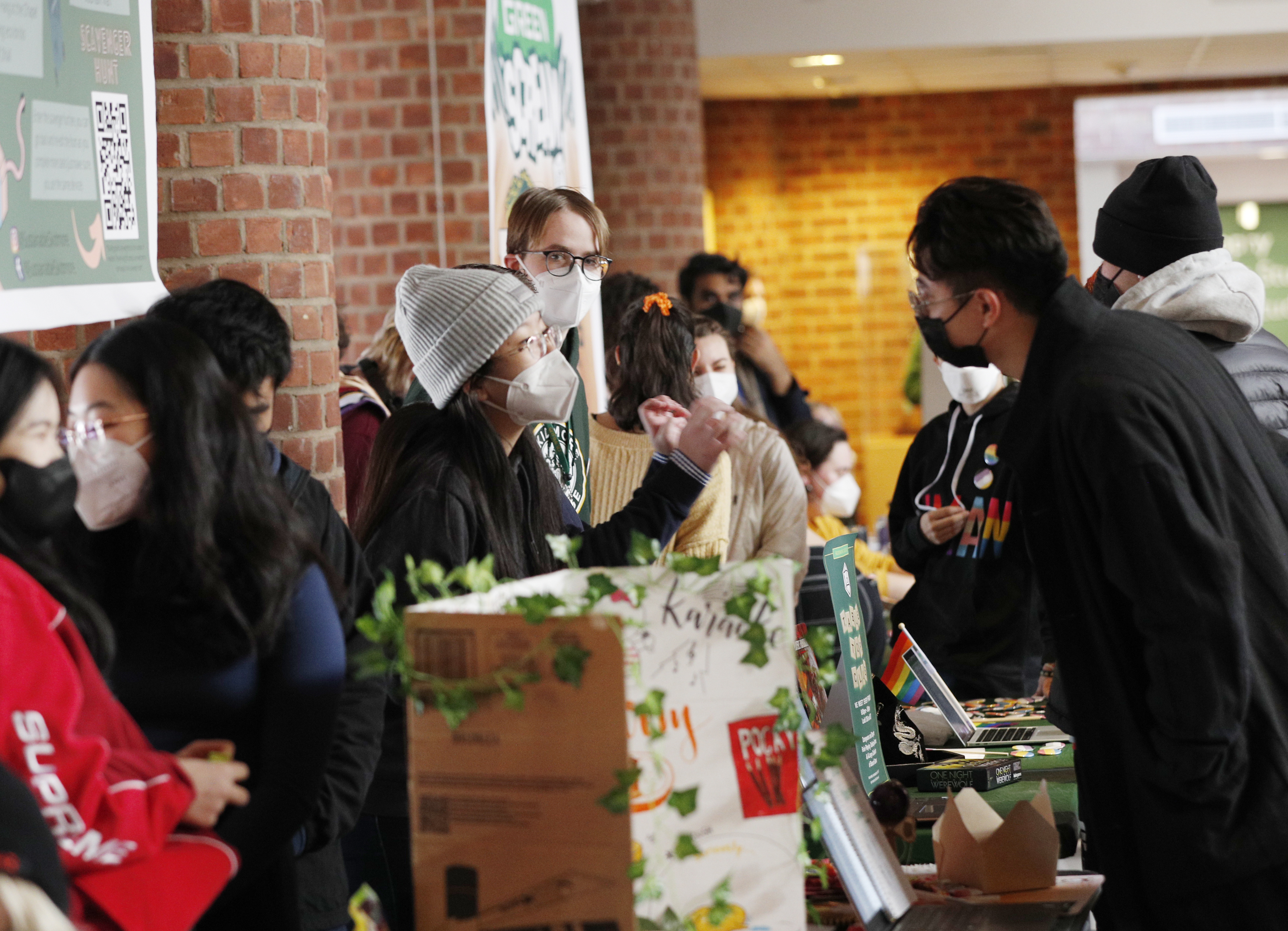 Students explore opportunities to get involved in Club Fair, a showcase of scores of student clubs at Skidmore.  