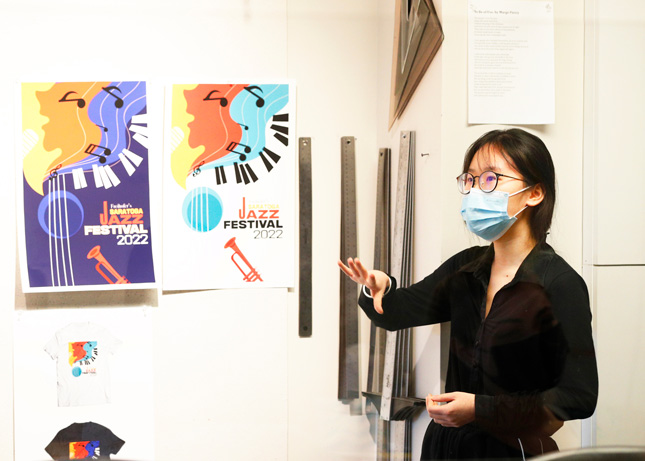Student discusses design for Jazz Fest logo