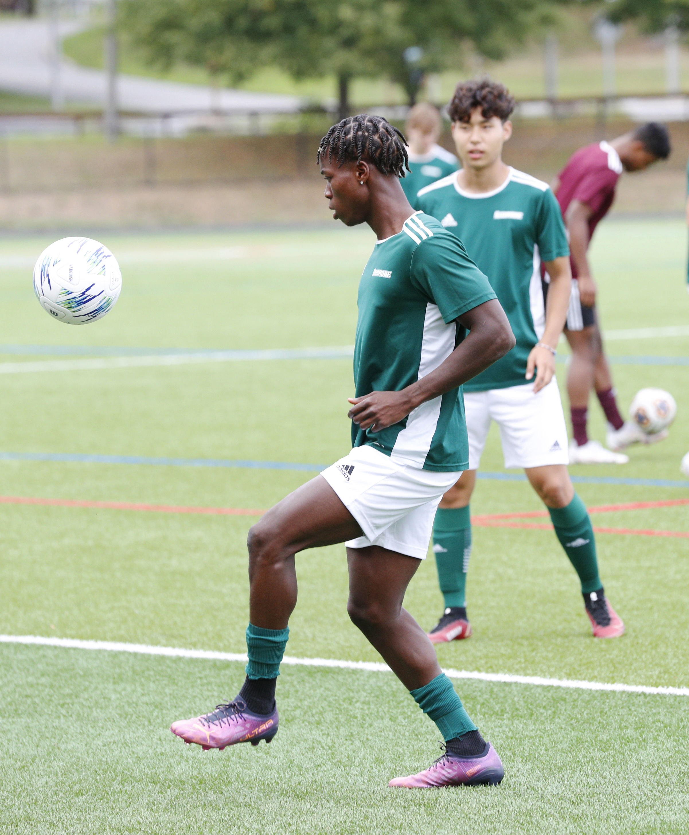 Members of the men's soccer team at practice