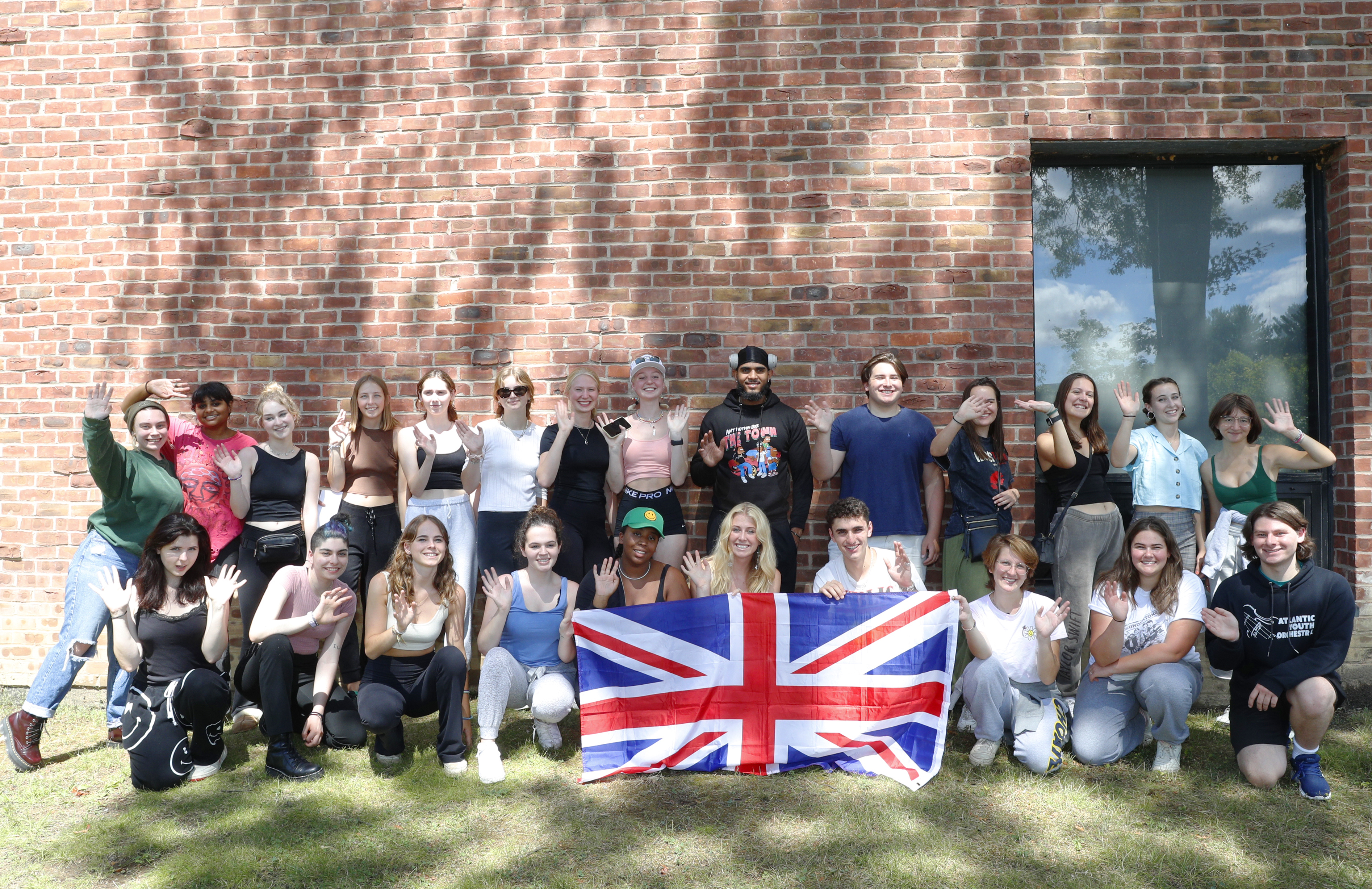 Students pose for a photo before leaving campus for London.