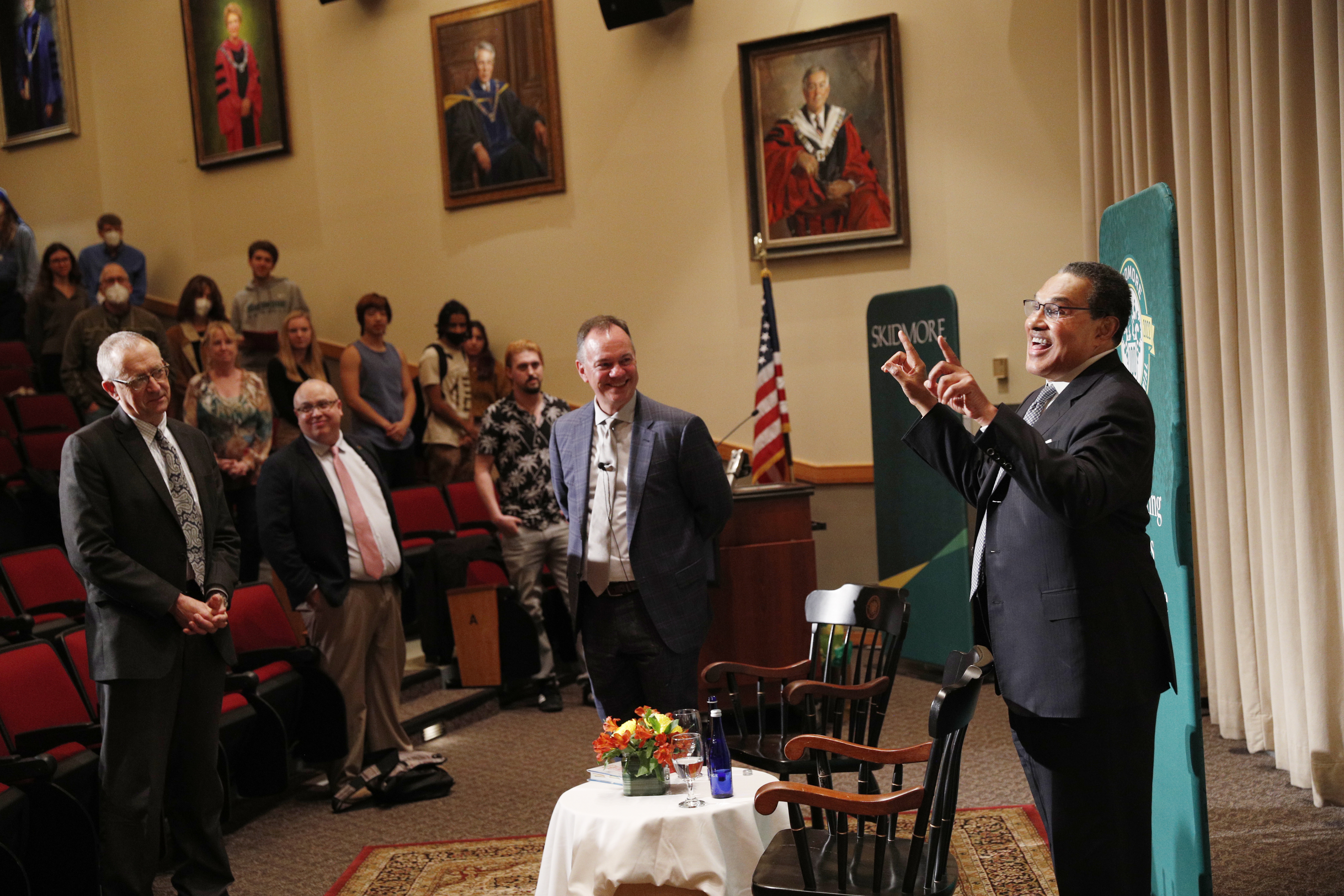 Freeman A. Hrabowski III, president emeritus of University of Maryland, Baltimore County, right, addresses the Skidmore community at an event in Gannett Auditorium. Dean of Faculty and Vice President for Academic Affairs Michael Orr, left, Joshua Woodfork, vice president for strategic planning and institutional diversity, and Skidmore College President Marc C. Conner, next to Hrabowski, were among many community members to participate.