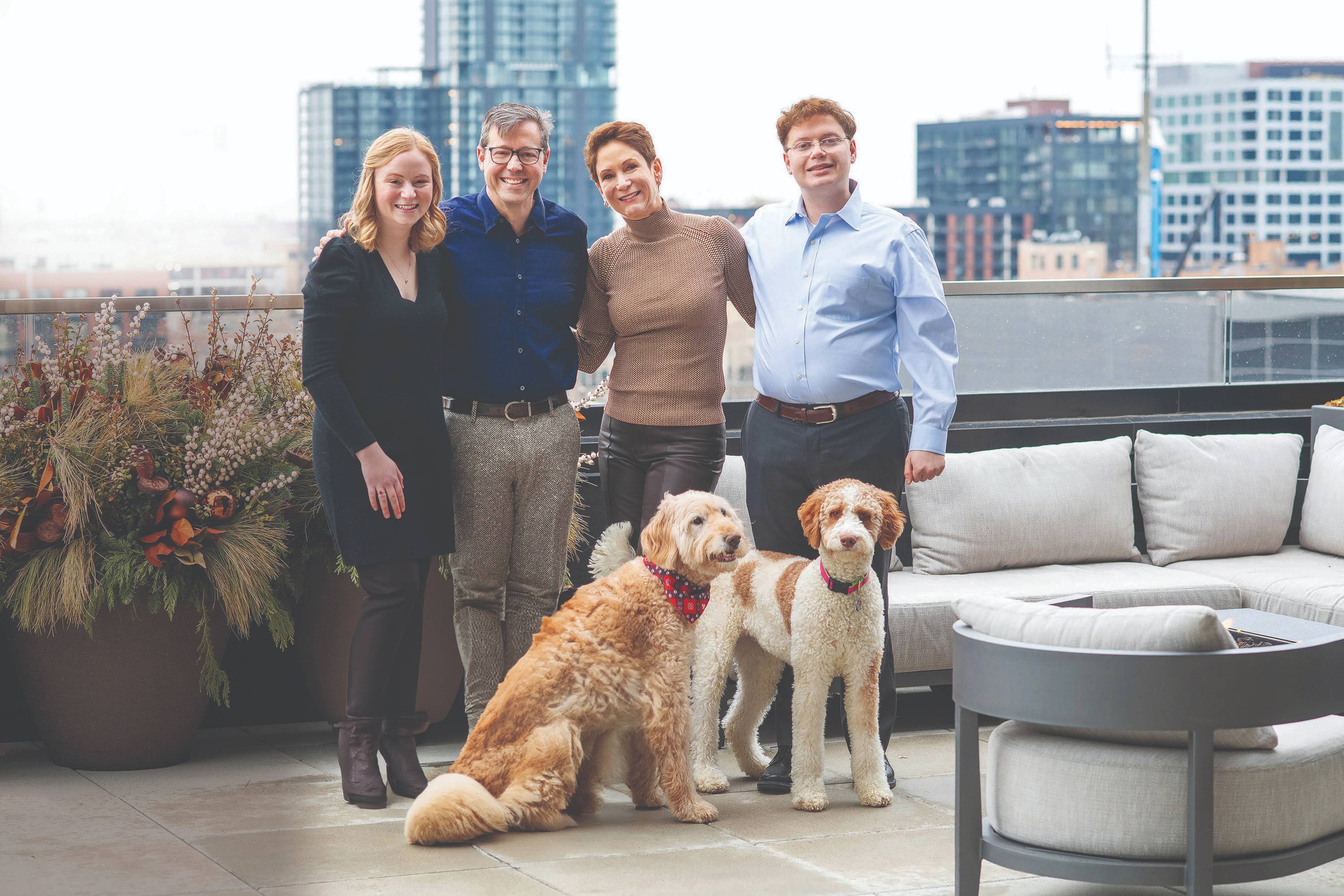 Katie and Erich Sternberg (center) with their children, Hallie (left), and Jake, (right)