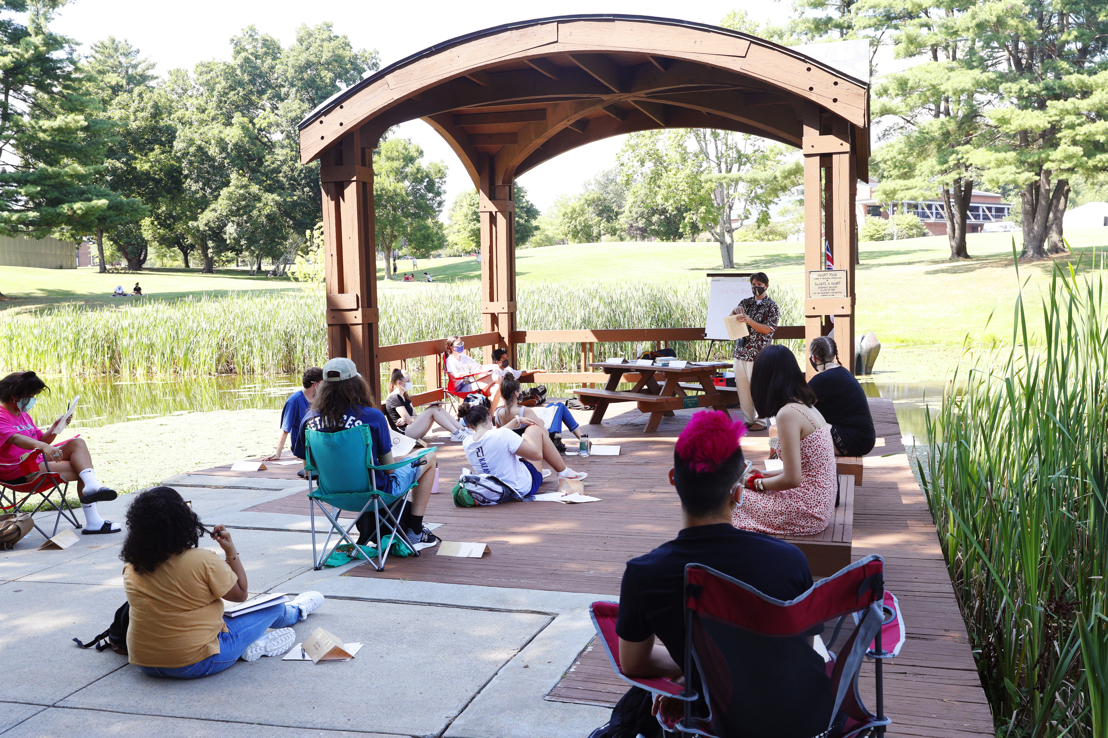 The journey of the Class of 2024 ended much differently than it started. Here, members of the Class of 2024 practice social distancing as they participate in Professor Tillman Nechtman's fall 2020 first-year Scribner Seminar.