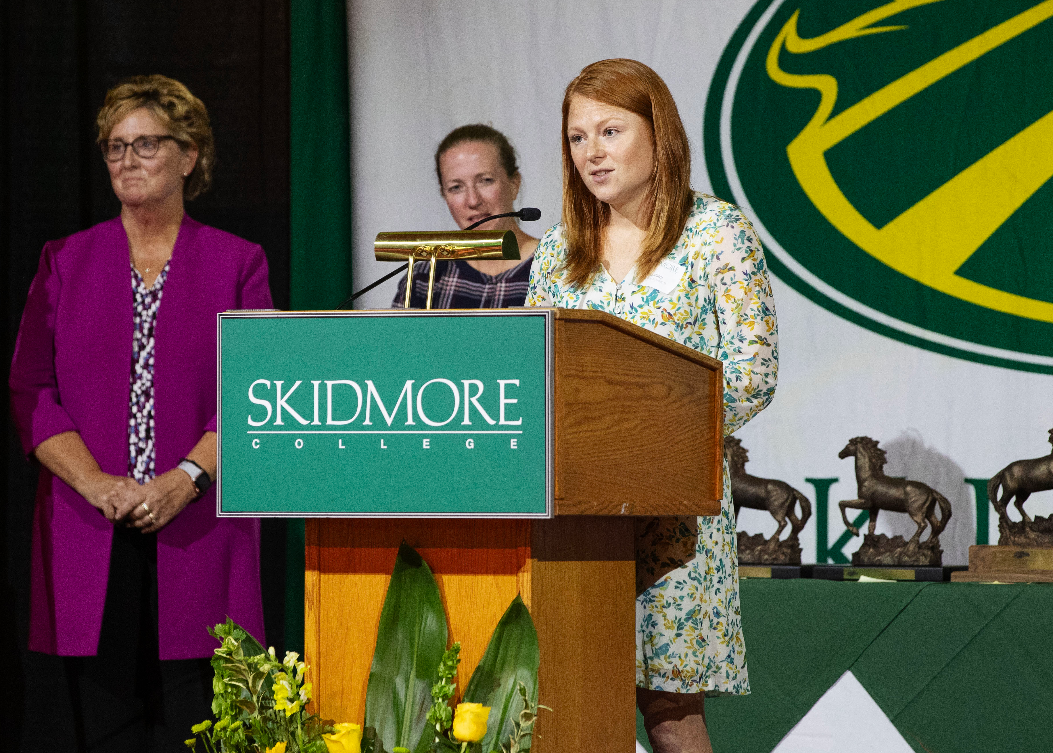 Lindsay Schmitt ’11 Lindsay Schmitt ’11 stands at the podium.