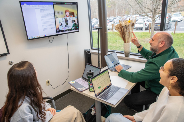 Mike Dunn, Heba Salman '25, and Robyn Karchere-Sun '26 meet with Clea O’Neil ’24