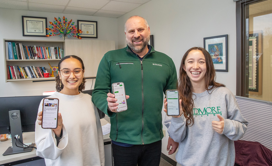 Associate Professor of Management and Business Mike Dunn, Heba Salman '25, and Robyn Karchere-Sun '26