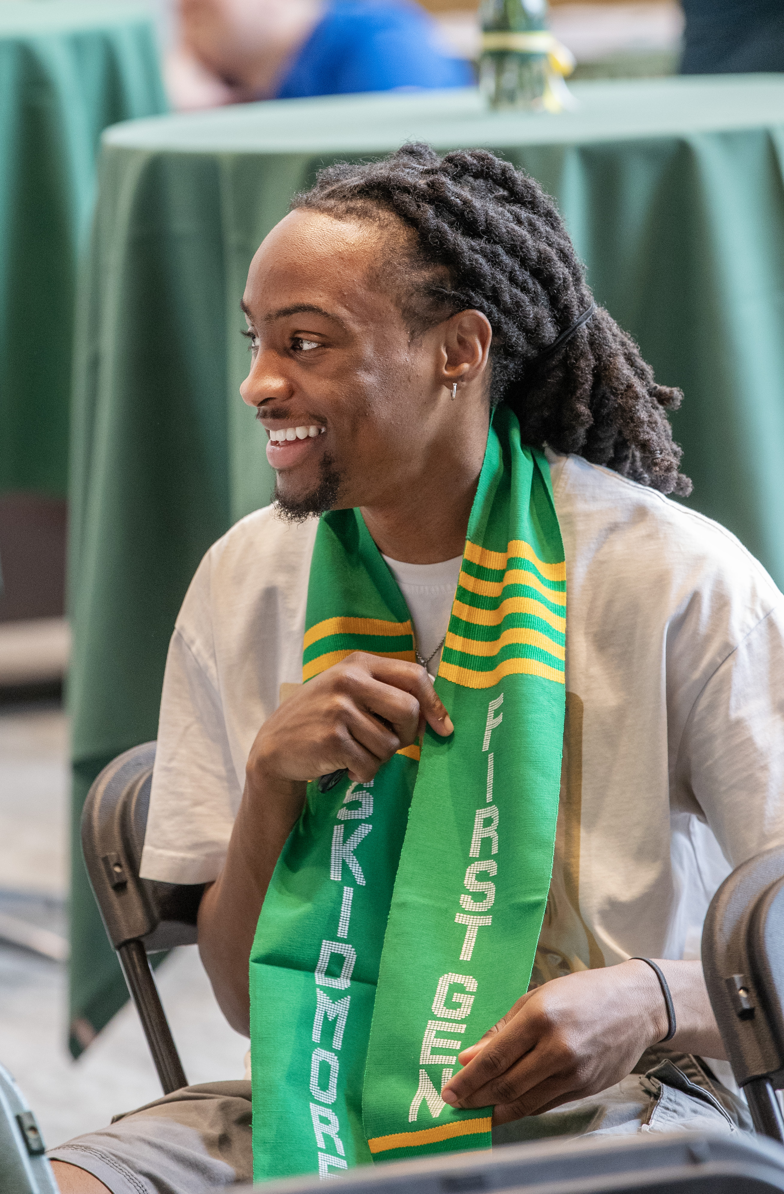 Ivory Gipson '25 celebrates personal accomplishments and those of classmates at the Stoles and Cords Celebration on Tuesday, March 13.