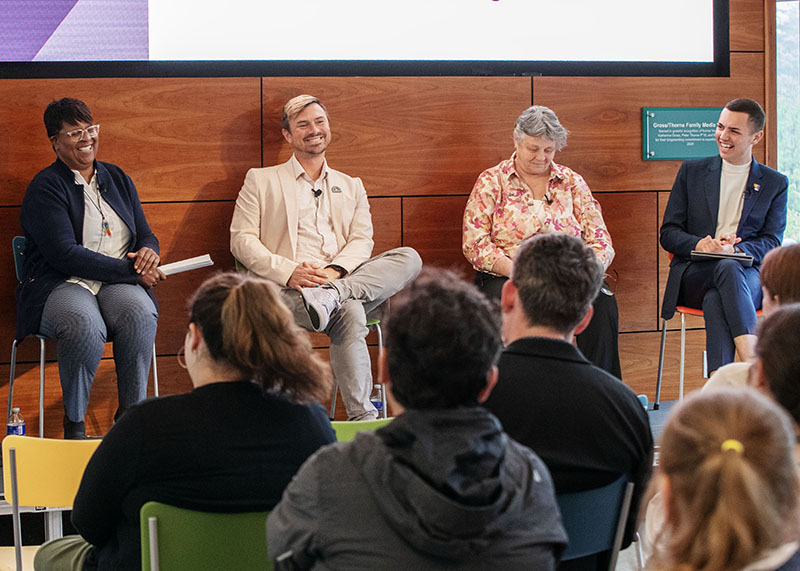 Four panelists on Wyckoff Center stage: Tandra LaGrone, Nathaniel Gray,Cindy Swadba, and Cam Cardinale, all smiling