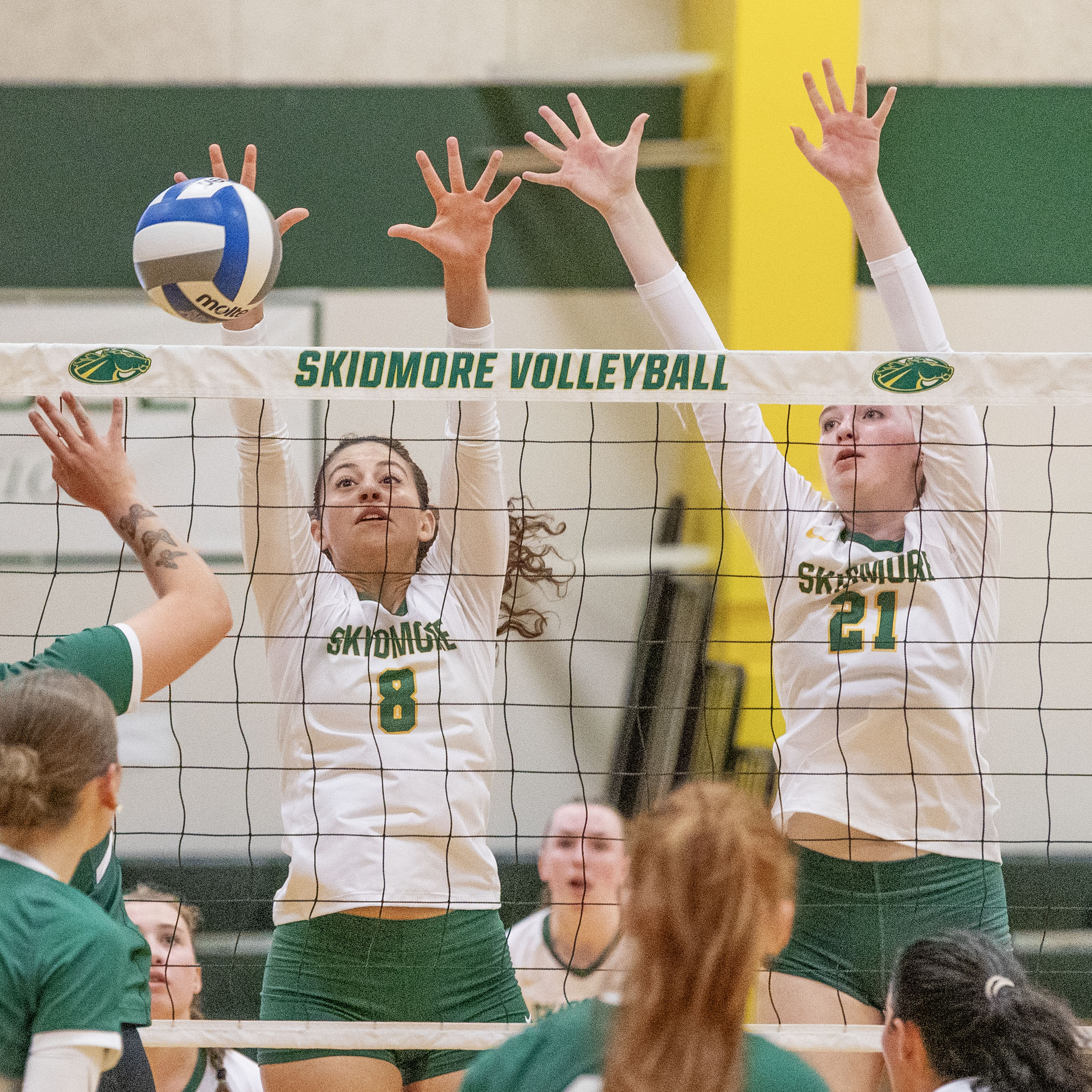 Skidmore+volleyball+players+Gabriella+Imburgia+%2727+and+Katy+O%27Connell+%2729+block+the+ball+against+Nichols+College+on+Friday%2C+Sept.+5.+