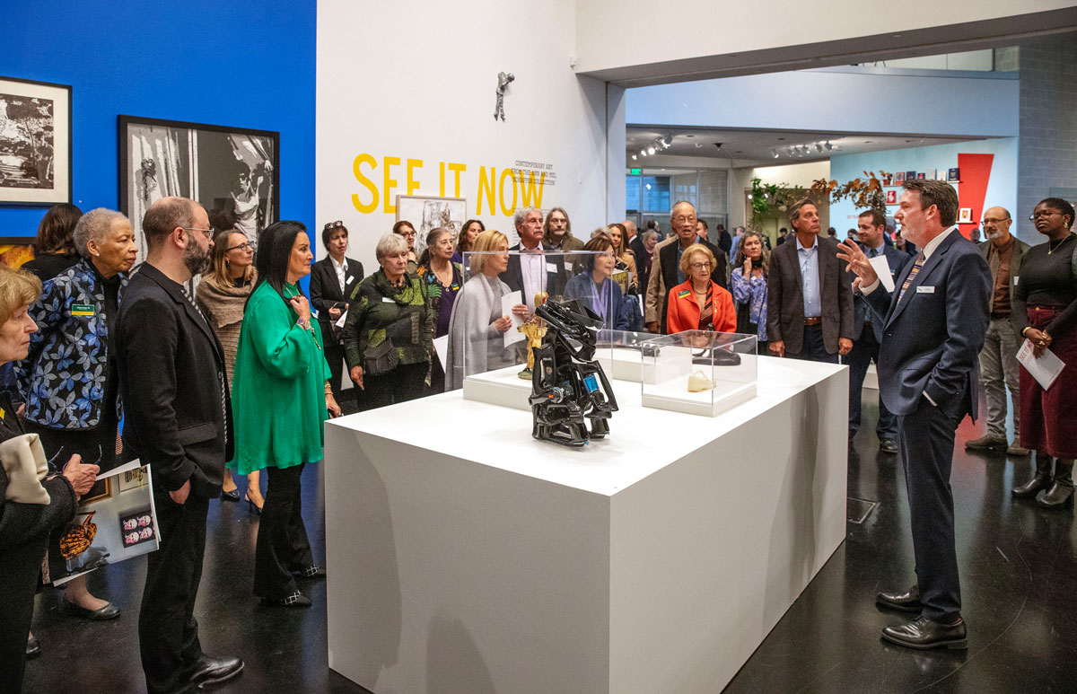 Dayton Director Ian Berry leads Skidmore College trustees and others on a tour of "See It Now: Contemporary Art from the Ann and Mel Schaffer Collection."