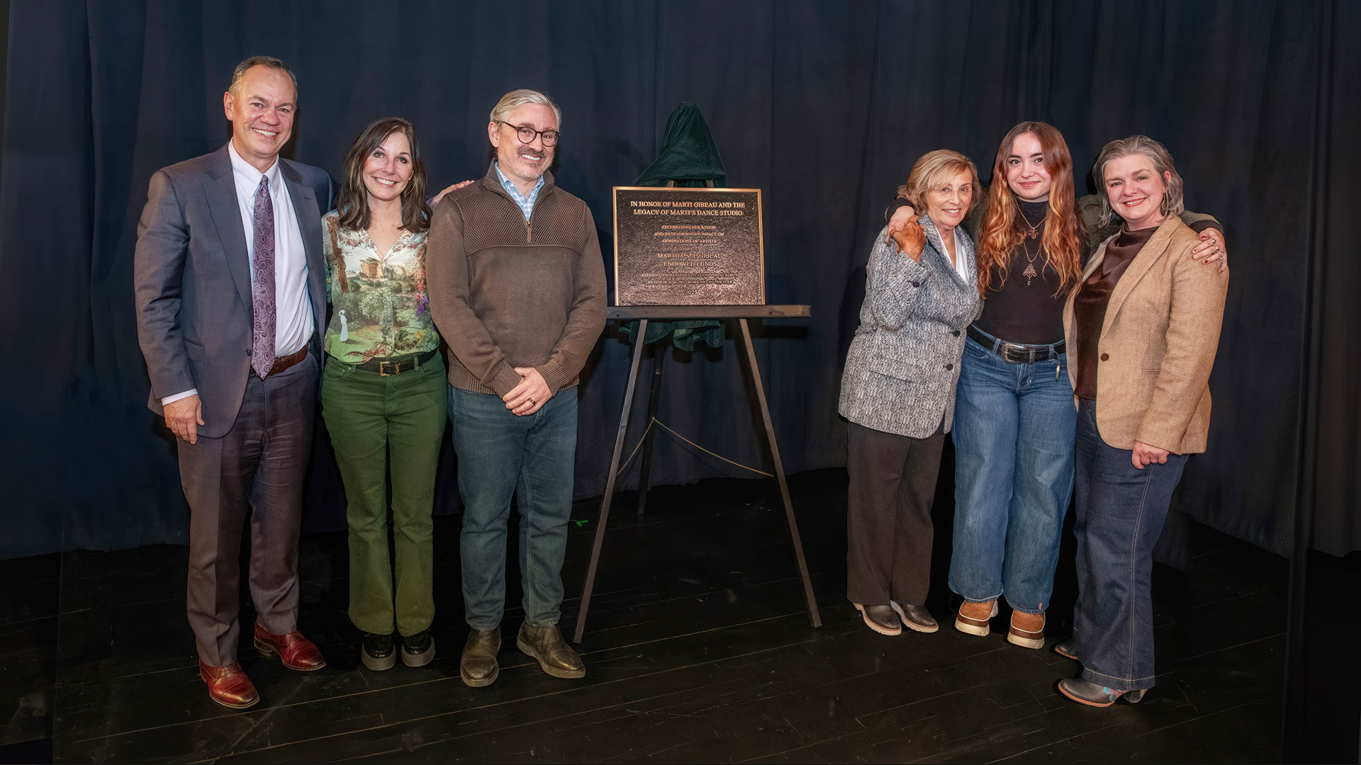 President Marc C. Conner, Michele Scott (Gibeau’s wife), Frank Gibeau, Martha “Marti” Gibeau G’27, theater major Penelope Gibeau ’27, and Lisa Jackson-Schebetta, a professor and chair of the Department of Theater. 