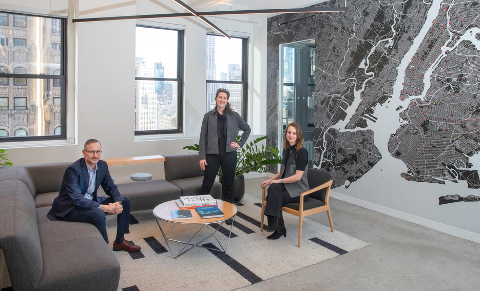 David Levine ’86, Rachel Ehrlich ’98, and Sara Brandt ’14 pose in the Dattner Architects office in New York City.