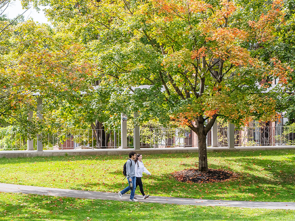two starts walking across Skidmore's campus during the fall 