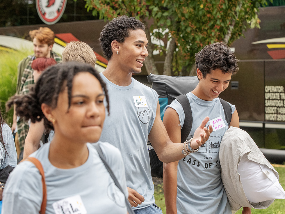 Students boarding the bus for Pre-Orientation 