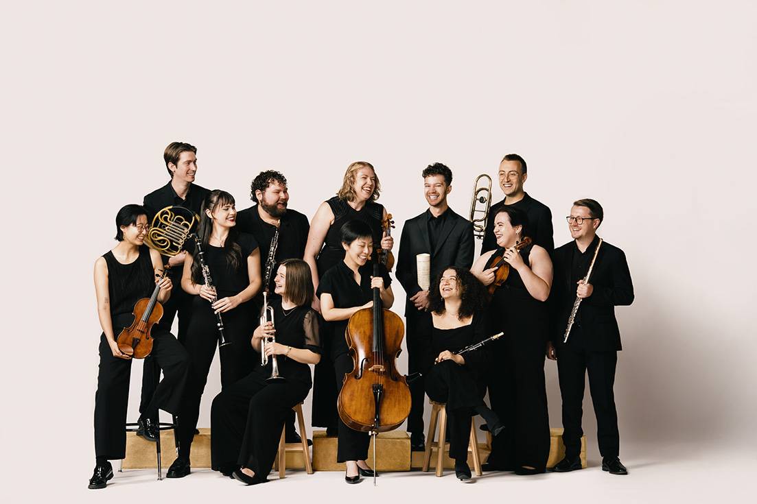 Group of musicians holding their instruments as part of Ensemble Connect residency.