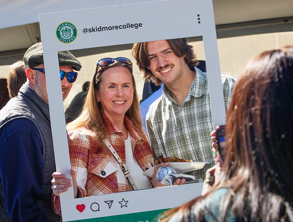 A family poses for a photo during Homecoming and Family Weekend 2026, Oct. 2-4.