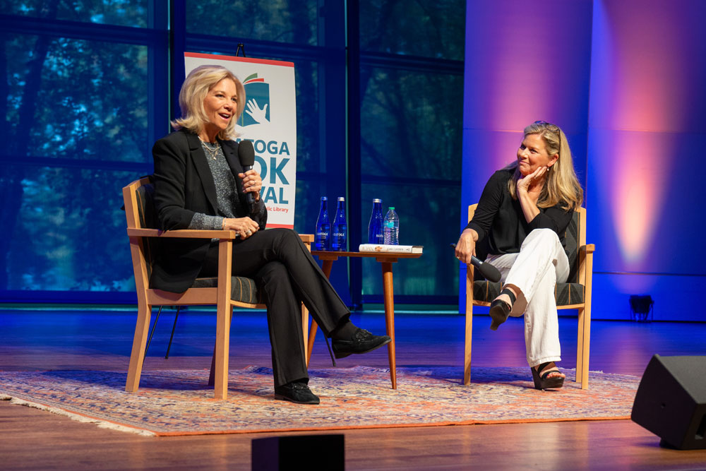 Joan Lunden and Julie Chapman talk while sitting on stage at Arthur Zankel Music Center